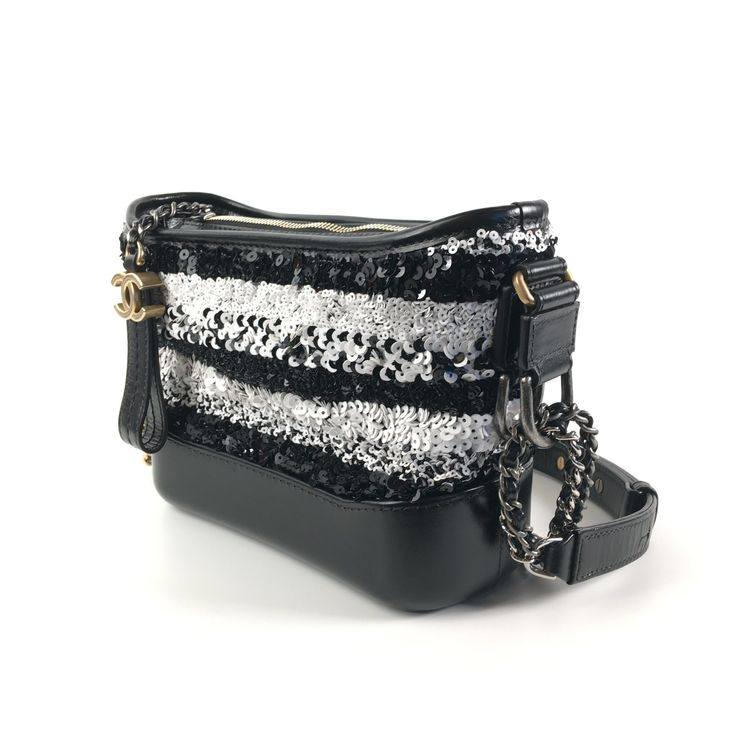 Condition:9.5/10 (Some Minor Flaws).Material:Sequins.Hardware:Gold; Ruthenium.Size:Black; White. Chic Formal Sequin Shoulder Bag, Chic Formal Bags With Sequins, Chic Sequins Shoulder Bag For Night Out, Chic Formal Sequin Bag, Chic Sequin Formal Bags, Black Evening Bags With Sequins, Luxury Evening Bags With Sequins, Black Sequined Bags For Formal Occasions, Designer Sequin Bags For Formal Occasions