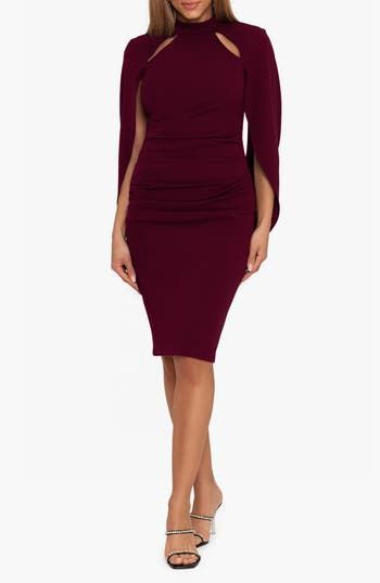 Go anywhere serving up serious confidence in this scuba sheath dress boasting a flirty cutout and cape-inspired overlay. 40" length (size 8) Mock neck Long sleeves Partially lined 94% polyester, 6% spandex Dry clean Made in the USA of imported fabric Formal Mini Dress With Cape Sleeves, Dressy Sheath Bodycon Dress For Cocktail, Chic Fitted Mini Dress With Cape Sleeves, Cocktail Bodycon Sheath Dress, Cocktail Sheath Mini Dress In Elastane, Stretch Sheath Bodycon Dress For Evening, Chic Sheath Bodycon Dinner Dress, Draped Bodycon Cocktail Dress, Fitted Dress With Cape Sleeves For Night Out