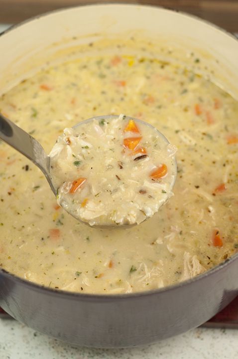 a ladle full of chicken pot pie soup