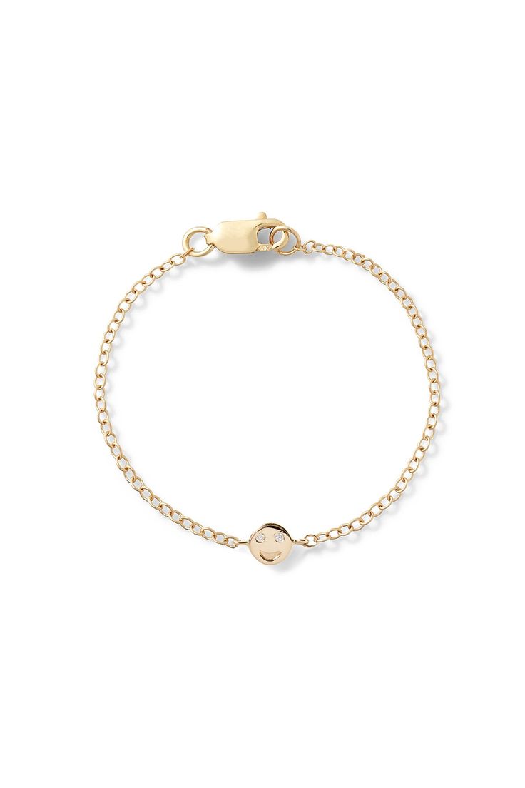 The happiest addition to any baby's wrist! Make your baby smile with our 14K Yellow Gold Happy Baby Bracelet featuring white diamond eyes. Please allow 15 business days for the production of this piece. This piece is final sale. 14K Yellow Gold, Made in New York City Find out what size you are with our wrist sizer *please note, a 1/2" extension will be added to any size you choose to accommodate your growing baby td {border: 1px solid #ccc;}br {mso-data-placement:same-cell;} Adjustable White Gold Bracelet For Everyday, White Gold Bracelet As Gift, Everyday Stackable Round Name Bracelet, Yellow Gold Round Charm Bracelet For Everyday Wear, Everyday Yellow Gold Round Charm Bracelet, Yellow Gold Round Charm Bracelet, Classic Everyday Birthstone Bracelets, Minimalist Jewelry With Smiley Face, Hypoallergenic Yellow Gold Charm Bracelet