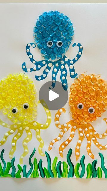 an image of three octopus made out of plastic beads