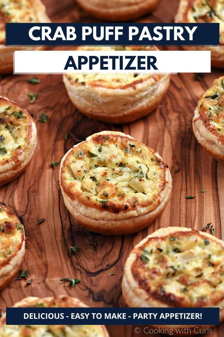 several small pizzas on a wooden board with text overlay that reads crab puff pastry appetizer delicious easy to make party appetizer