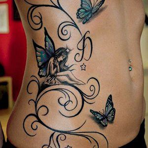 a woman's stomach with butterflies on it