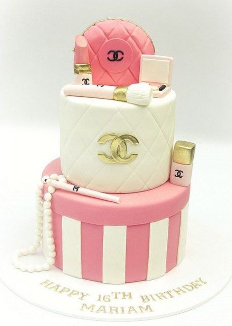 a pink, white and gold chanel cake on instagram