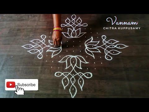 a person standing on top of a wooden floor next to a white rangdi design