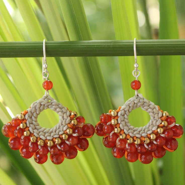 the earrings are made with red beads