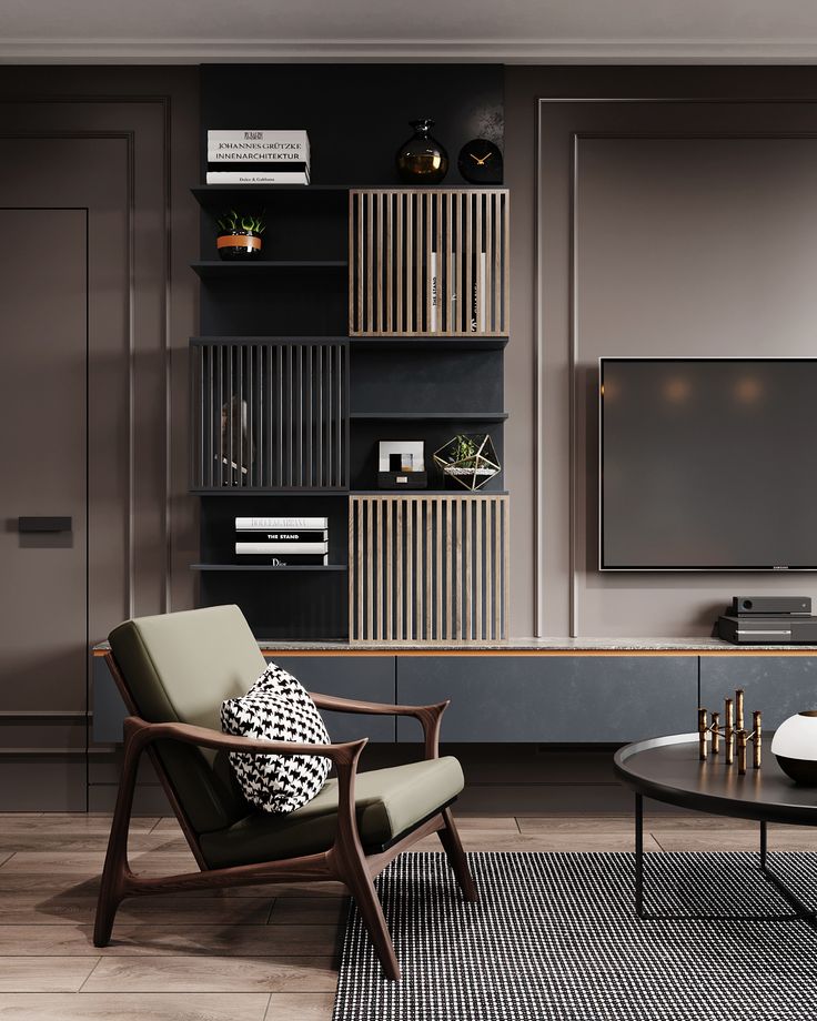 a living room filled with furniture and a flat screen tv mounted on a wall next to a coffee table