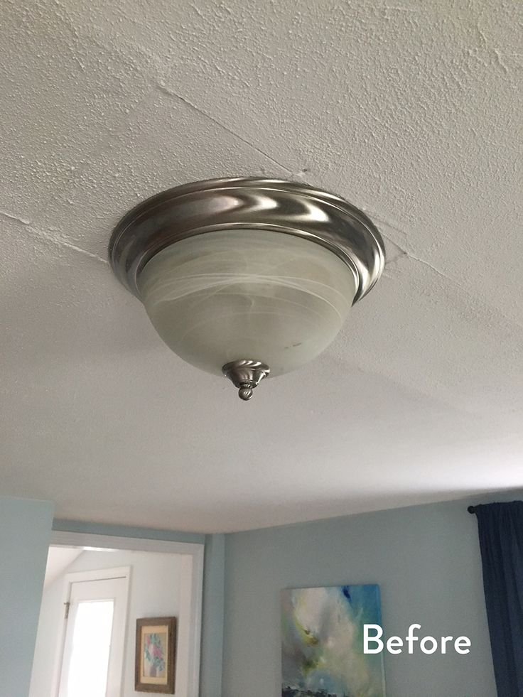 a ceiling light that is on in a room