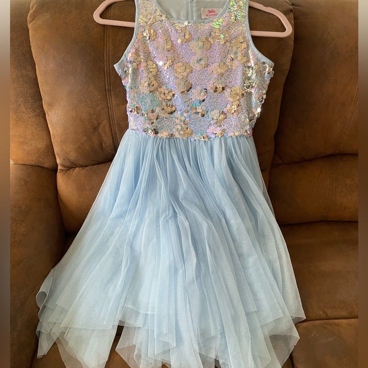 Dress From Justice Perfect For Spring/Summer Events Such As Birthday, Weddings We Never Got Around To It But One Of My Daughters Favorites. The Shimmer Is Perfect Sleeveless Blue Tutu Dress For Dress-up, Blue Sequin Dress For Dress-up, Light Blue Tutu Dress For Summer Dress-up, Light Blue Sleeveless Princess Dress For Party, Sleeveless Blue Tutu Dress For Party, Cute Summer Princess Dress For Fancy Dress, Summer Sequin Tutu Dress For Dress-up, Light Blue Sleeveless Princess Dress For Summer, Summer Tutu Dress With Sequins For Dress-up