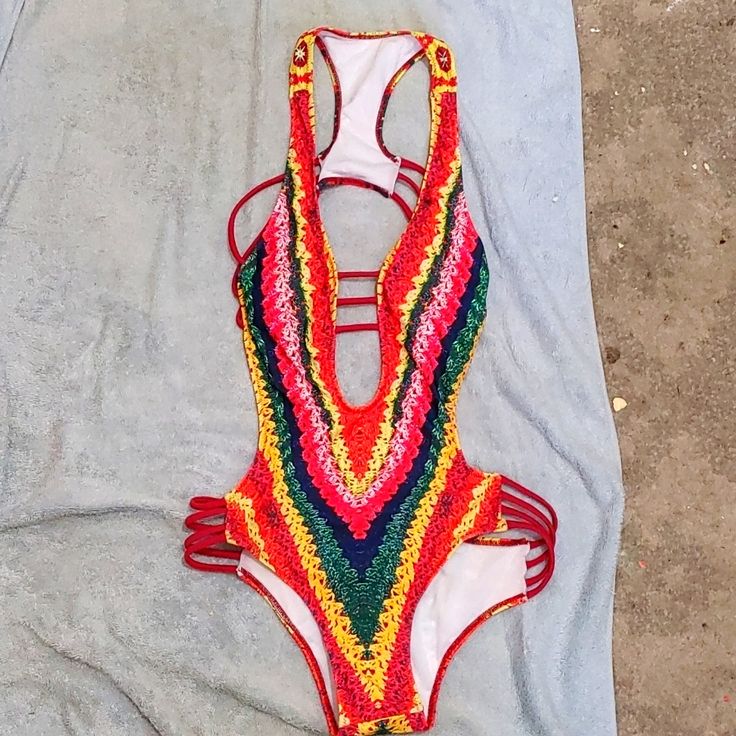 Beautiful Sexy Never Used Medium Colorful One-Piece Swimsuit. Multicolor Stretch Bodysuit For Beach Party, Stretch Multicolor Bodysuit For Beach Party, Multicolor V-neck Party Swimwear, Multicolor Beachwear One Piece For Party, Multicolor Beachwear One-piece For Party, Multicolor V-neck Swimwear For Party, Multicolor One Pieces For Summer Party, Vibrant Party Swimwear For Spring, Vibrant Spring Party Swimwear