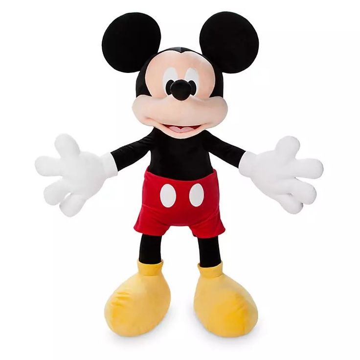 the mickey mouse stuffed animal is wearing red shorts