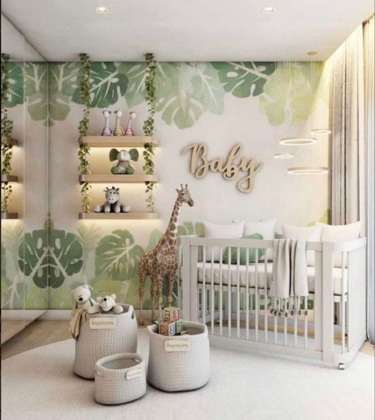 a baby's room with green and white wallpaper