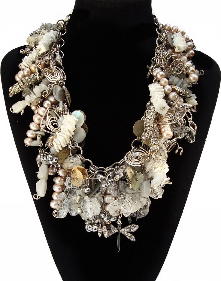 Handmade original Freshwater pearl, shell, rose quartz, silver diamante clusters, silver paillettes and silver plate charm necklace on silver plate double link chain. Weight: 405gms An opulent confection of jewels, gemstones, dragonflies, fairies and butterflies. A fairytale necklace, perfect for a Midsummer's Night's Ball. Unique Party Jewelry With Charms, Exquisite Handmade Silver Necklaces, Whimsical Silver Necklaces With Charms, Silver Necklace With Natural Stones, Whimsical Silver Necklace For Party, Whimsical Silver Necklaces For Party, Silver Charm Necklace For Wedding, Silver Wedding Necklace With Charms, Wedding Silver Necklaces With Charms