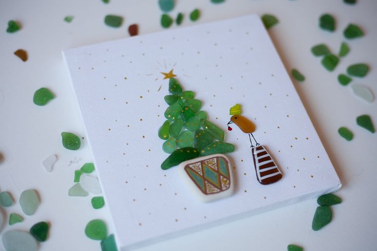 a card with a christmas tree on it