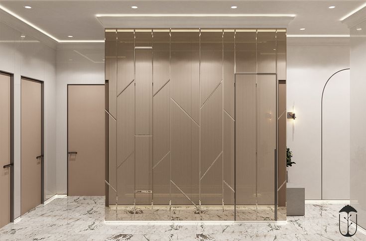 an empty room with marble flooring and beige partitions on the wall to separate it from other rooms