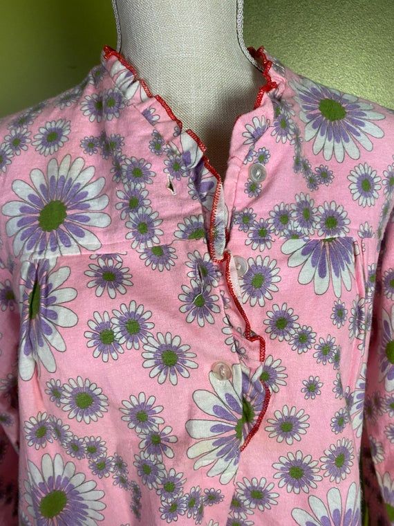 1960’s/70’s pink flannel long sleeve nightgown with white, green and purple flowers. Has a few buttons near the neckline. Red piping around the collarSize large or smallerMax bust: 40”Max hips: 46”Shoulder to hem: 47” Long Sleeve Night Gown, Long Sleeve Nightgown, Pink Flannel, Womens Nightgowns, Peignoir Sets, Women's Nightgowns, Satin Slip, Nightgowns, Vintage 1960s