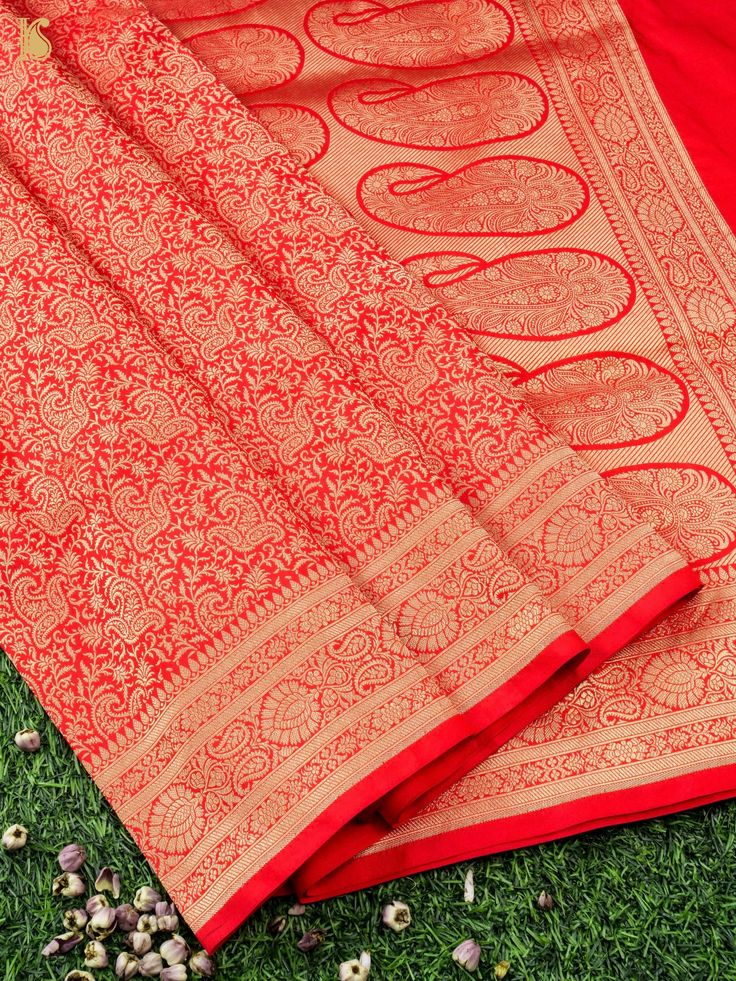 Experience the luxurious elegance of our Katan Silk Tanchoi Sarees, handcrafted with intricate Banarasi designs and premium Katan silk fabric. Available in a range of colors and styles, these sarees are the perfect choice for any special occasion Luxury Katan Silk Traditional Wear With Cutdana, Banarasi Silk Traditional Wear With Self Design For Ceremonies, Festive Banarasi Silk Pre-draped Saree For Traditional Ceremonies, Elegant Jamawar Traditional Wear For Puja, Art Silk Pashmina Shawl With Traditional Drape, Banarasi Silk Pashmina Shawl With Zari Work For Puja, Art Silk Shawl For Puja, Art Silk Pashmina Shawl With Self Design, Festive Pre-draped Banarasi Silk Saree With Zari Weaving