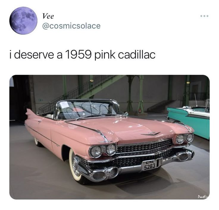 an old pink car parked in a garage with the caption i desevve a 1950 pink cadillac