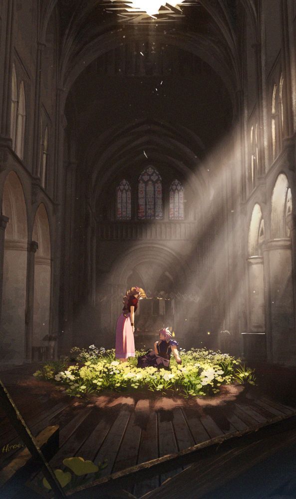 two people standing on a stage in a large building with sunlight coming through the windows