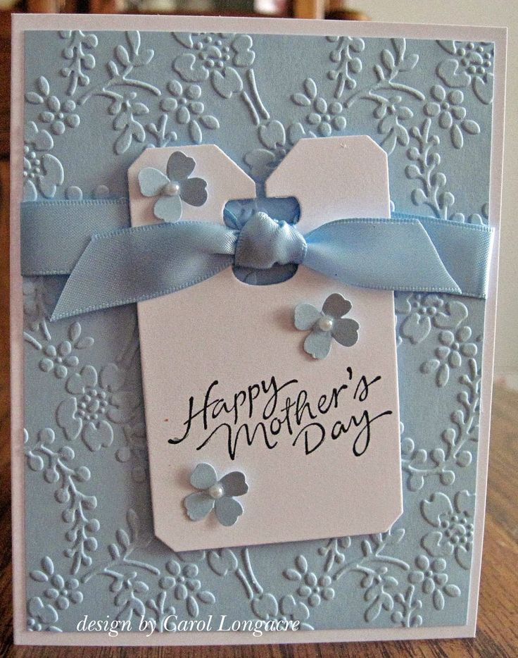 a blue and white card with a tag on it that says happy mother's day