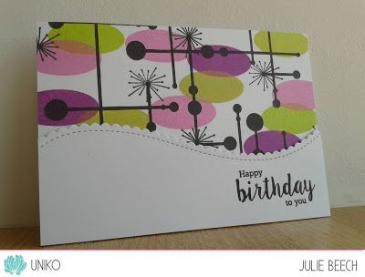 a birthday card with an abstract design on it