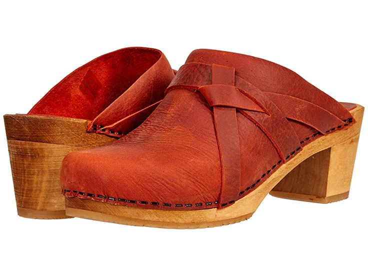 Sanita Manuella - Women's Shoes : Burnt Orange : Slide into a fashionable, comfortable style with the versatile Sanita Manuella clog sandals. Heeled clogs with a cushioned, open-back silhouette. Oiled leather upper with a decorative knot detail. Flexible wood midsole made from wood harvested from FCS-approved sustainable forests. Rubber outsole for added traction and durable wear. Imported. Measurements: Heel Height: 2 1 4 in Weight: 12 oz Platform Height: 1 in Product measurements were taken us Casual Slingback Clogs With Wooden Heel, Comfortable Open-heel Clogs With Wooden Heel, Rubber Sole Slingback Clogs, Beach Leather Clogs With Arch Support, Brown Clogs With Arch Support For Spring, Comfortable Beach Clogs With Leather Sole, Comfortable Slingback Clogs With Removable Insole, Comfortable Clogs With Arch Support, Casual Clogs With Cushioned Footbed And Open Heel