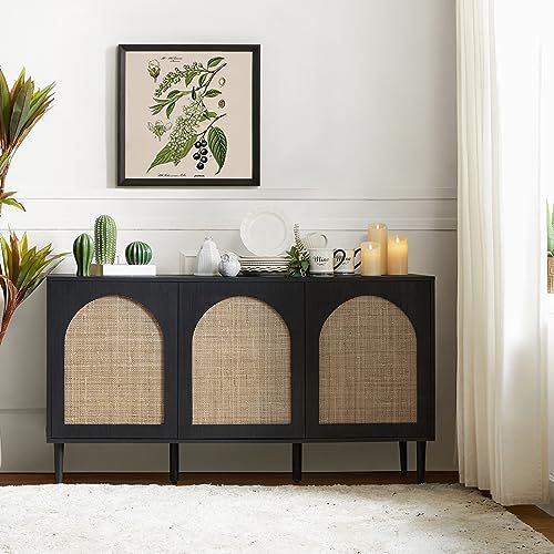 a living room with white walls and plants on the sideboard in front of it