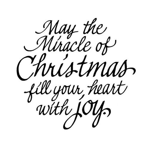 the phrase may the grace of christmas fill your heart with joy, written in black ink