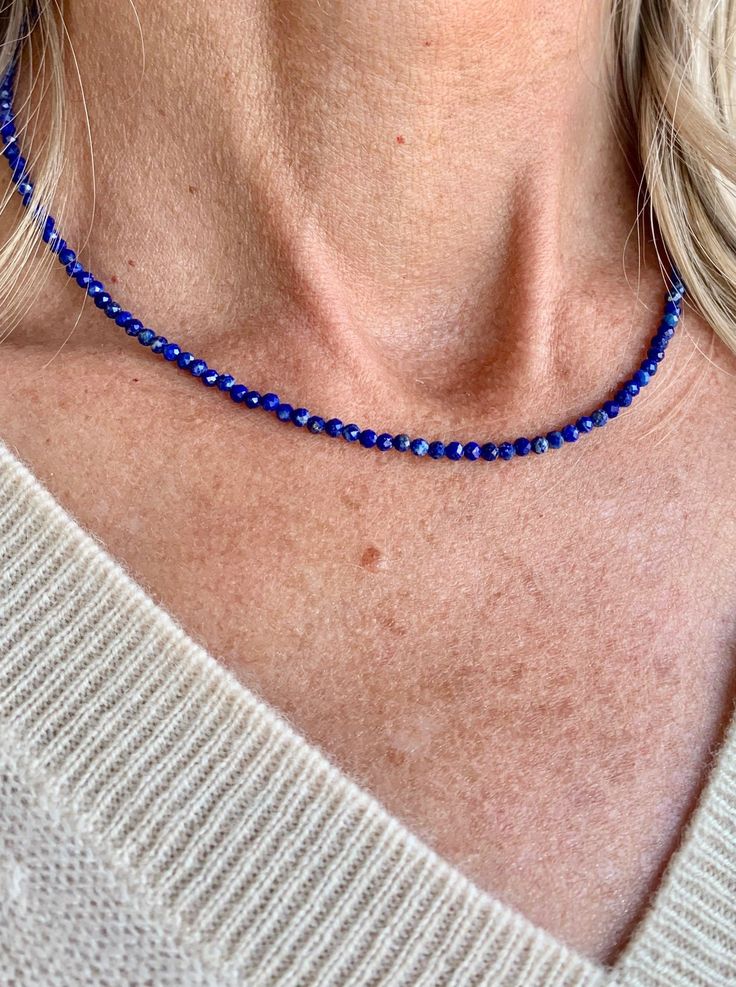 lapis | tiny crystal choker necklace | radiant malas | handmade in boulder colorado Lapis Lazuli Round Beads Jewelry For Healing, Sapphire Beaded Necklaces With Natural Lapis Lazuli Stones, Adjustable Single Strand Crystal Necklace For Healing, Adjustable Single Strand Lapis Lazuli Necklace, Blue Lapis Lazuli Polished Beads Jewelry, Adjustable Blue Crystal Necklace With Natural Stones, Blue Lapis Lazuli Necklace With Natural Stones, Sapphire Colored Lapis Lazuli Single Strand Necklace, Blue Spiritual Necklaces With Natural Stones