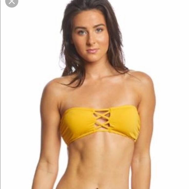 Mustard Yellow Strapless Bikini Top With Criss Cross Detail In Front And Back. Comes With Detachable Straps That Tie Around The Neck. Good Support On Both Sides And Rubber Lining (Like A Strapless Bra) To Hold You Up. Still Has Tags Attached Bought On Posh But Was Too Big, Trying To Get Some Of My Money Back Strapless Gold Tube Top For Summer, Yellow Bandeau Tube Top For Beach, Yellow Summer Tube Top For Beach, Summer Yellow Tube Top For Vacation, Summer Style Yellow Tube Top For Vacation, Yellow Strapless Swimwear For Poolside, Yellow Bandeau Tube Top For Vacation, Yellow Tube Top For Beach, Yellow Strapless Tube Top For Vacation