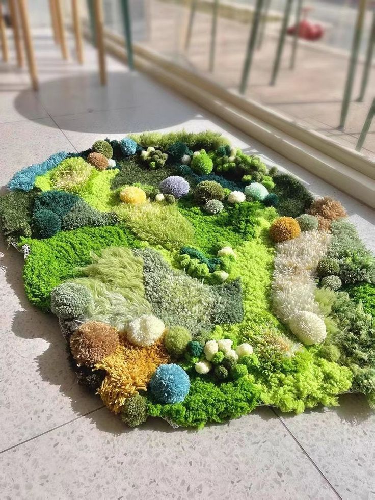 an area rug made out of various types of plants