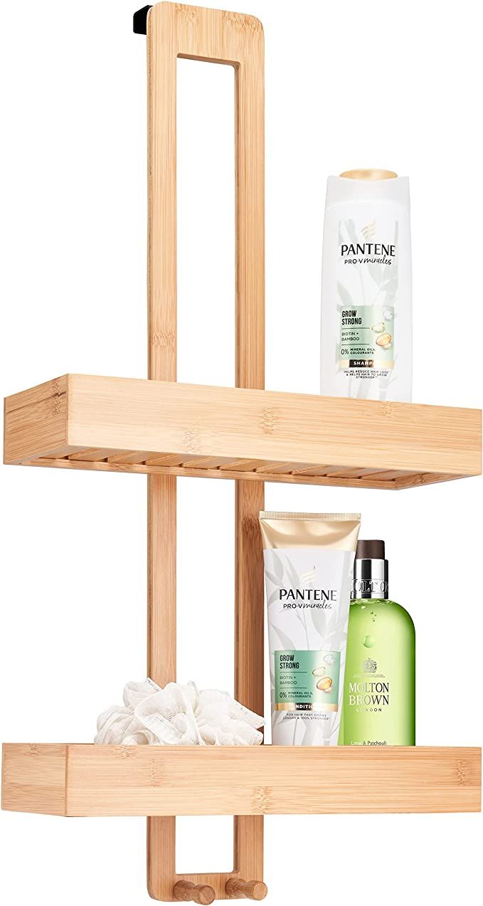 two wooden shelves with bottles and soaps on them in front of a white background