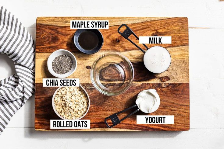 a wooden cutting board topped with different types of food and ingredients to make maple syrup