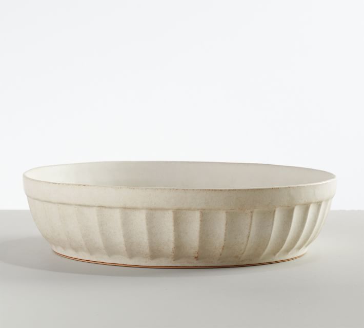 a white bowl sitting on top of a table