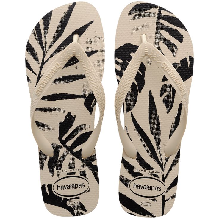 Answer the call of summer with the havaianas Aloha men's flip flops in beige, your perfect companion for beach adventures. Featuring a tropical print that adds elegance to the flip flops you already know and love, these are a must-have addition to your summer wardrobe. Embrace comfort and style as you soak up the sun with the havaianas Aloha men's flip flops, designed to keep you looking and feeling cool all season long. Havaianas Aloha Flip Flops Sandal | Beige | Size 13 Luxury Designer Flip Flops, Silly Clothes, Personalized Flip Flops, Printed Flip Flops, Havaianas Flip Flops, Beach Adventure, Women Shoes Flats Sandals, Hawaiian Print, Tropical Print