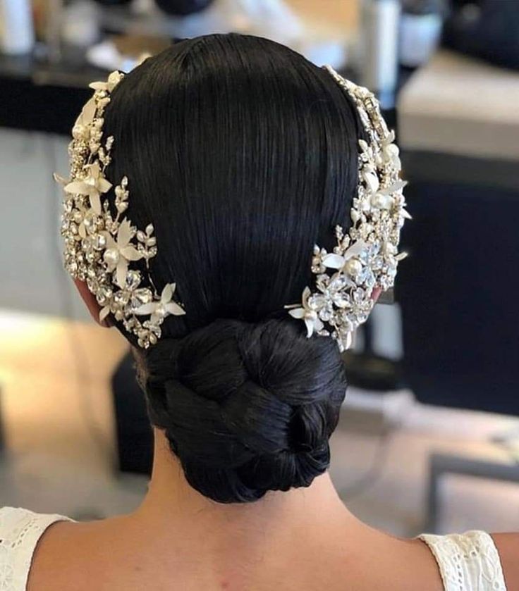 a woman wearing a bridal hair piece