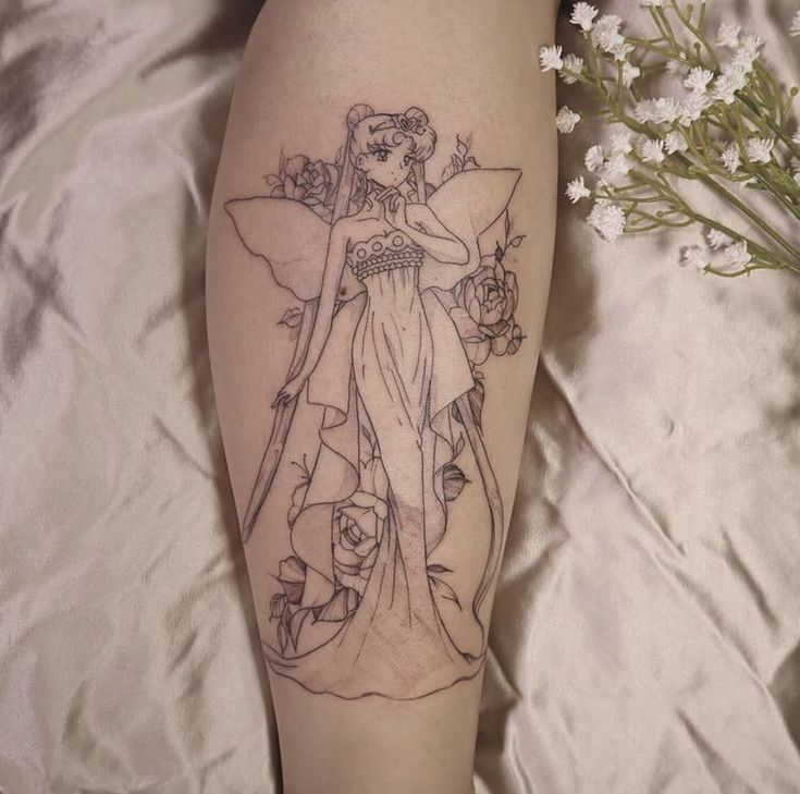 a tattoo on the leg of a woman with flowers in her hand and a fairy holding a wand