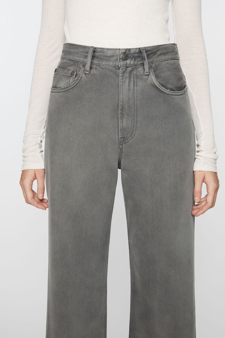 2022 jeans are cut to a relaxed fit with a high waist, wide leg and long length. Made from rigid denim in a faded mineral tint wash with an irregular finish. Acne Studios 2022 Saxon Faded Flare Jeans With Straight Hem, Faded Cropped Jeans With Five Pockets, Modern Wide Leg Washed Black Jeans, Modern Washed Black Wide Leg Jeans, Faded Cropped Jeans With Straight Hem, Faded Straight Hem Bottoms For Fall, Faded Bottoms With Straight Hem For Fall, Fall Faded Rigid Denim Flare Jeans, Modern High-rise Washed Black Jeans