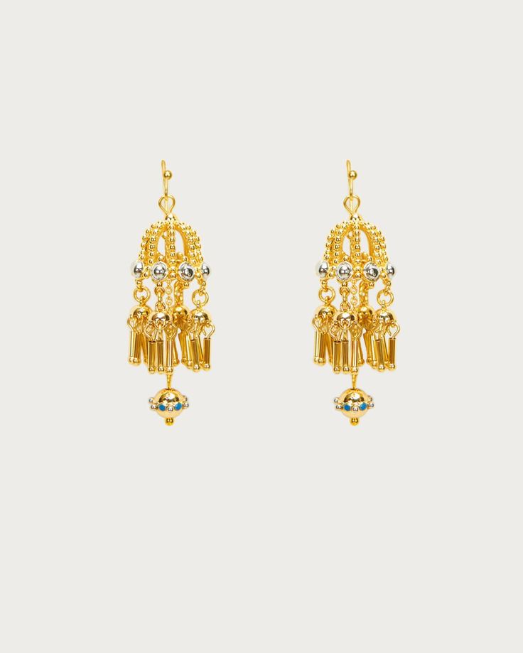 These retro style drop earrings are like tiny cages holding mysterious little elves. Their delicate, intricate parts make crispy, subtle whispers by your ears. They catch the light and sway with every move, sprinkling shimmering sparkles on your skin. Hey, actually, wearing them makes you look as delightful as an elf! 🧚💛 Materials: 18k gold plated brass Measurement: 52mm/2.04" in length, 16mm/0.63" in width En Route Jewelry, An Elf, Retro Fashion, Elf, 18k Gold, Sparkle, Plating, Thing 1, Brass