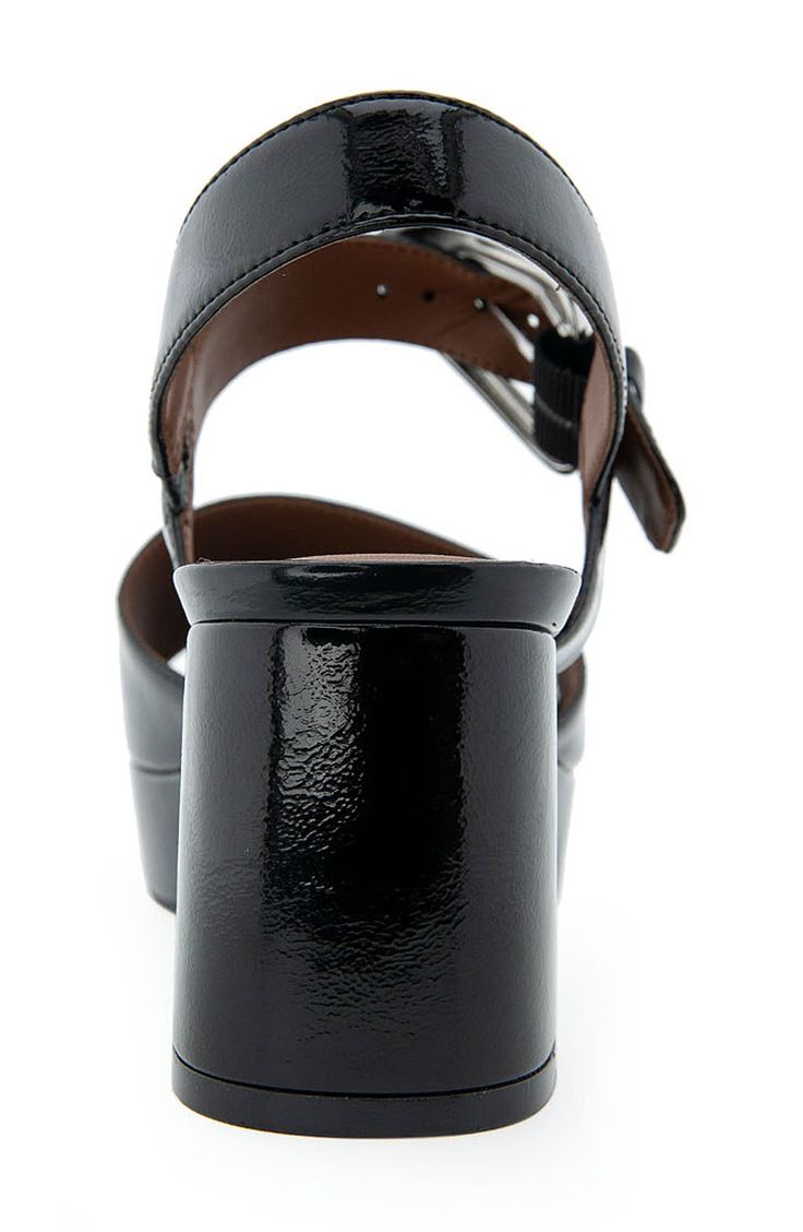 A gleaming buckle and slingback strap secure a versatile sandal lifted by a wrapped platform and chunky block heel. Synthetic or leather upper/synthetic lining/rubber sole Imported Wide Width Sandals, Comfort Shoes Women, Faux Leather Heels, Platform Sandals Heels, Chunky Block Heels, Sandal Women, Back Strap, Platform Heels, Leather Material