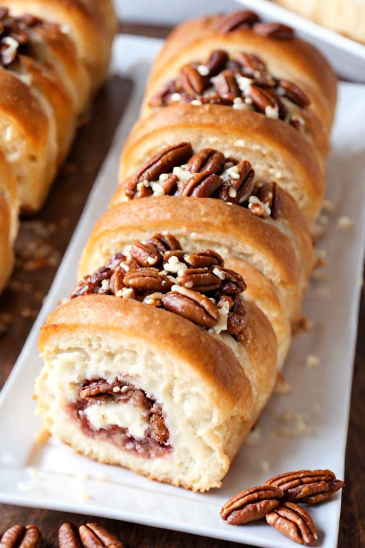 Pecan Cream Cheese Rolls Recipe

Ingredients

- 1 package (8 oz) cream cheese, softened
- 1/2 cup butter, softened
- 1 cup sugar
- 1 teaspoon vanilla extract
- 1 package (1 lb) refrigerated crescent roll dough
- 1 cup chopped pecans
- 1/2 cup brown sugar
- 1 teaspoon ground cinnamon
- 1/4 cup maple syrup

Full Cooking Instructions on... Small Nut Rolls, Cream Cheese Rolls Recipe, Cheese Rolls Recipe, Cream Cheese Dough, Nut Rolls, Cheese Rolls, Cream Cheese Rolls, Pecan Rolls, Beef Noodle Soup