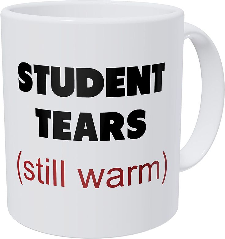 a white coffee mug with the words student tears still warm in red and black on it