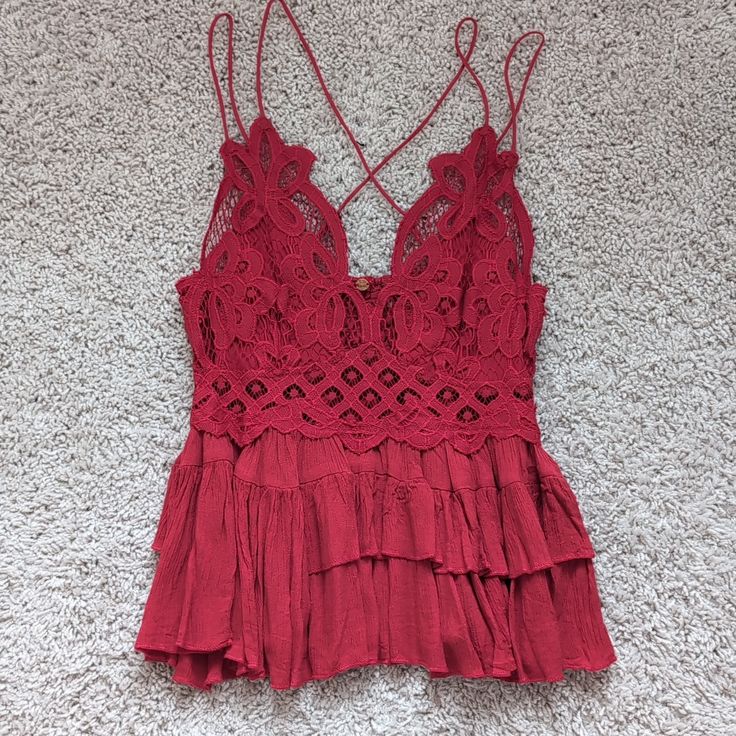 Free People Tank Top On Gorgeous Red ! Nwt! Tiered Front With Beautiful Lacy/Crochet Detailing On Top Criss Cross Back, Adjustable Red V-neck Top With Lace Trim, Red Sleeveless Lace Top, Red Lace Top For Summer, Red Lace Trim Top For Summer, Red Bohemian Tops With Lace Trim, Bohemian Red Tops With Lace Trim, Red Lace Tops For Summer, Red Fitted Crochet Lace Top, Red Crochet Lace Casual Top