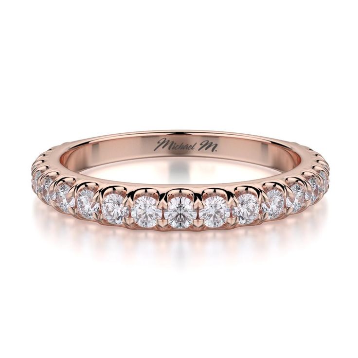 STONE INFORMATION This Michael M ladies wedding band is adorned with brilliant round shaped prong set diamonds, and are placed in a beautiful 3/4 way ring style. For any questions about this wedding band or other Michael M fine jewelry items, consult your local authorized Michael M retailer for more information. METAL INFORMATION Crafted by the jewelry masters of Michael M, this wedding band is made using exquisite 18-karat white gold, breathtaking with a peerless gleam and glow. Long-lasting an Diamond Skull, Diamond Girl, Wedding Band Designs, Half Eternity Wedding Band, Diamond Supply Co, Set Ring, Eternity Wedding Band, Womens Wedding Bands, Brilliant Diamond