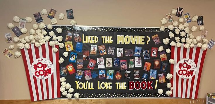 a movie themed bulletin board with popcorn on it