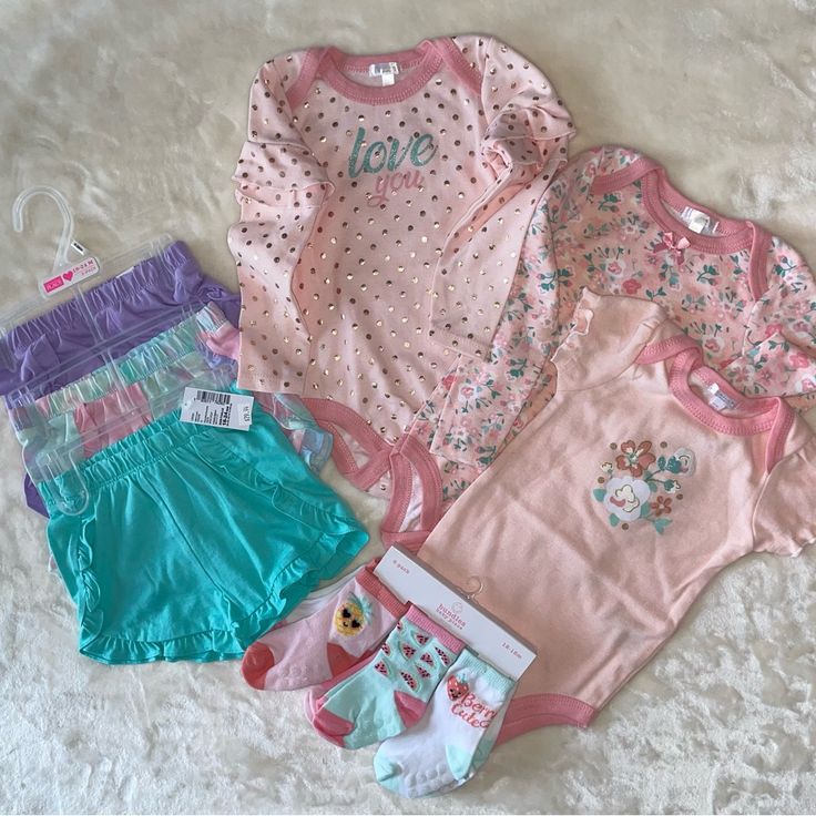 Girls Lot Of Clothing Includes: 1 - Nwot Tahari Baby Pink Onesies, Set Of 3 *Size: 24 Months 1 - Nwt Children’s Place Lounge Shorts With Ruffle Accents, Set Of 3 *Size: 18-24 Months *Hangers Not Included To Save On Shipping Costs 1 - Nwt Children’s Place Pink Pearl 6-Pack Socks *Size: 12-18 Months Pink Bedtime Sets For Spring, Pink Spring Bedtime Sets, Pink Spring Sleepover Sets, Cute Cotton Sets For Daycare, Playful Pink Top For Bedtime, Playful Pink Sleepover Sets, Playful Pink Bedtime Sets, Cute Pink Playtime Sets, Pink Cotton Playwear Sets