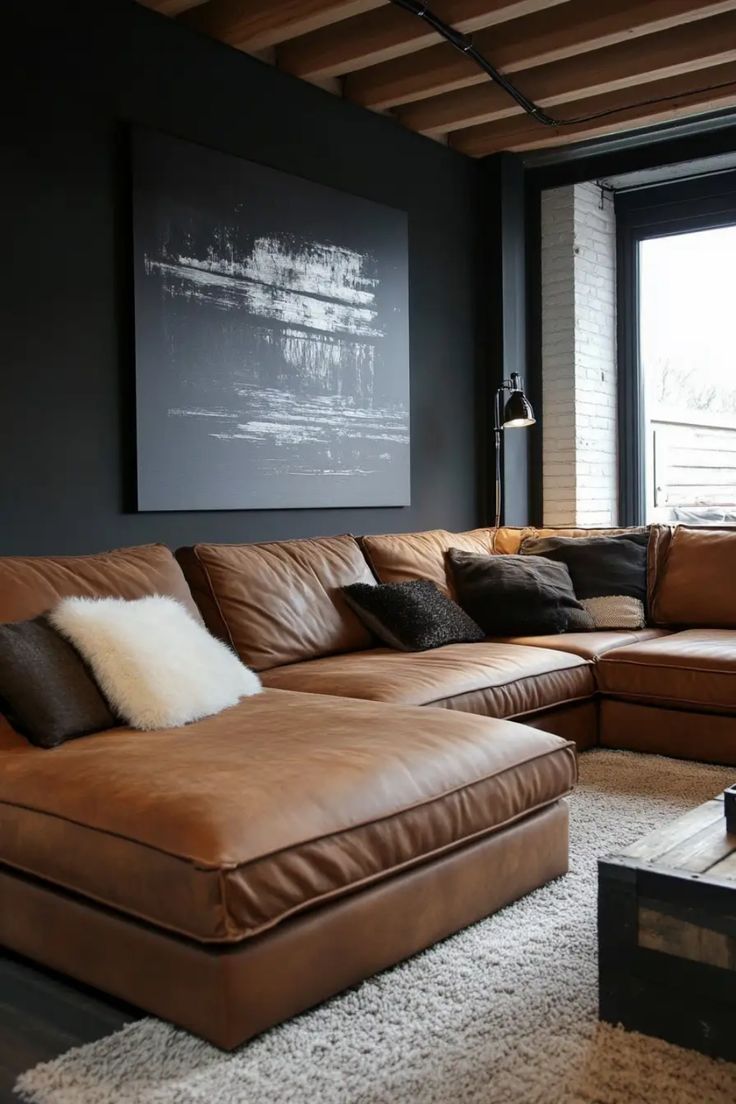 a living room filled with lots of brown furniture