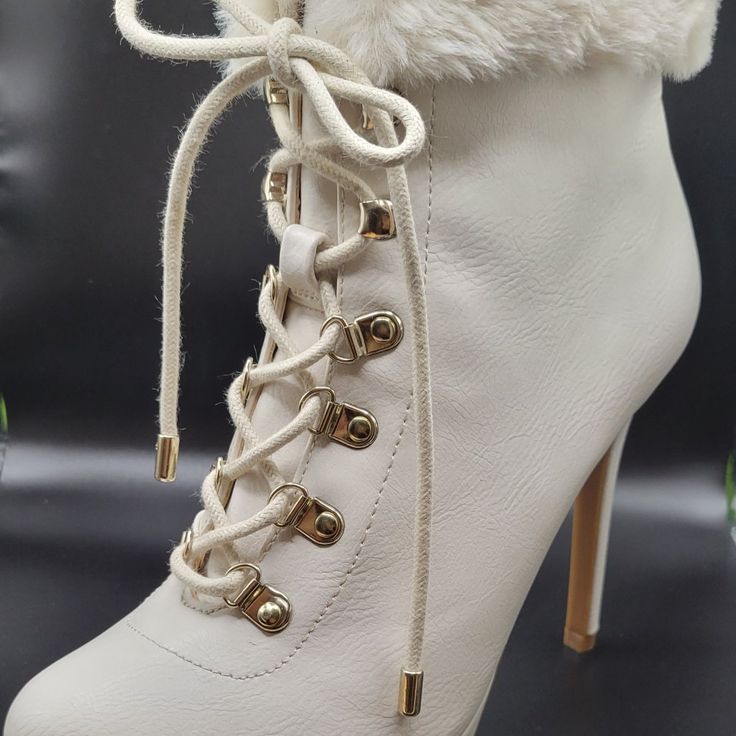 Thalia Sodi, Ivory Color Cream Ankle-high Lace-up Boots For Winter, Cream Synthetic Boots For Winter, Cream Synthetic Winter Boots, Winter Cream Synthetic Boots, Beige Platform Heels For Winter, Cream Leather Lace-up Boots With Round Toe, Cream Round Toe Winter Booties, White Ankle-high Winter Heels, White Ankle-high Heels For Winter