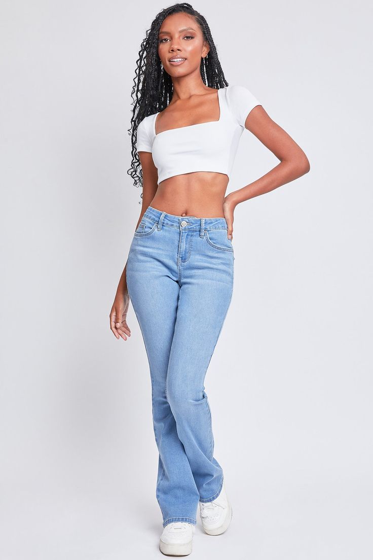 Give your old jeans the boot and scoot into our Women’s Mid-Rise Bootcut Jeans. Constructed with midweight stretchy denim, this stylish mid-waisted jean is fitted from the hip through the thigh and flares out slightly from knee to hem for a dreamy bootcut silhouette. Detailed with a classic five-pocket construction, a zip fly with button closure, and the cutest flap back pockets with snap buttons. Style with your favorite fitted top and sassiest boots for a look that’ll make a statement. Product Mid Rise Bootcut Jeans, Mid Waist Jeans, Ymi Jeans, Blue C, Old Jeans, Fitted Top, Women Essentials, Medium Blue, Bootcut Jeans