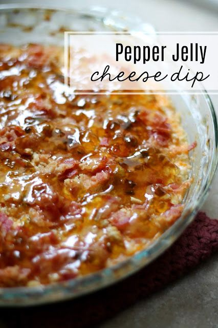 a close up of a casserole dish on a table with the words pepper jelly cheese dip